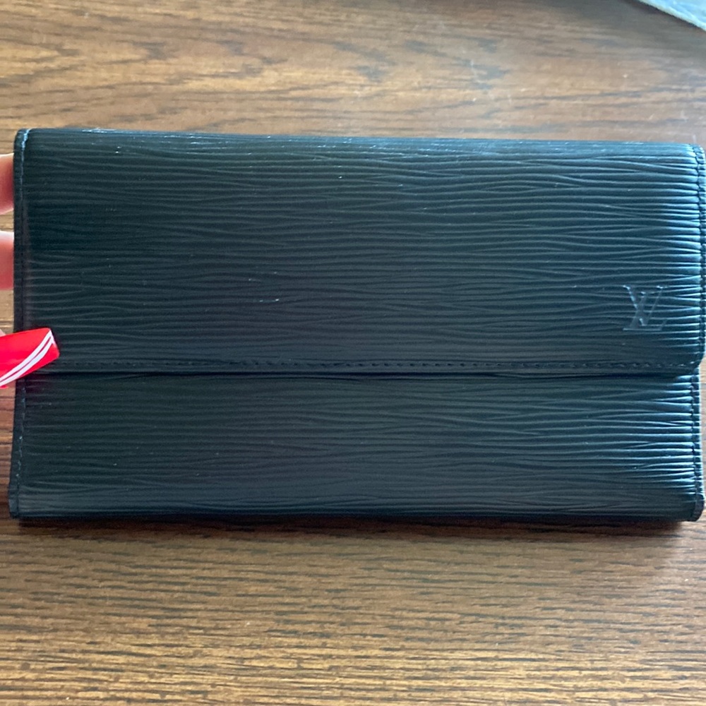 Authentic Louis Vuitton black epi wallet. Gently used no wear